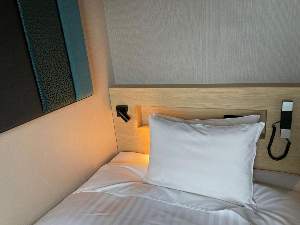 Kohoku Hotel Цутиура Экстерьер фото