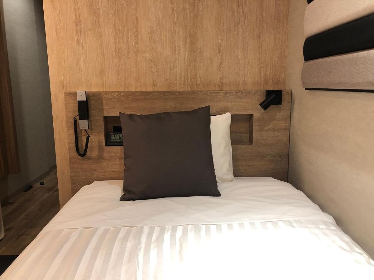 Kohoku Hotel Цутиура Экстерьер фото