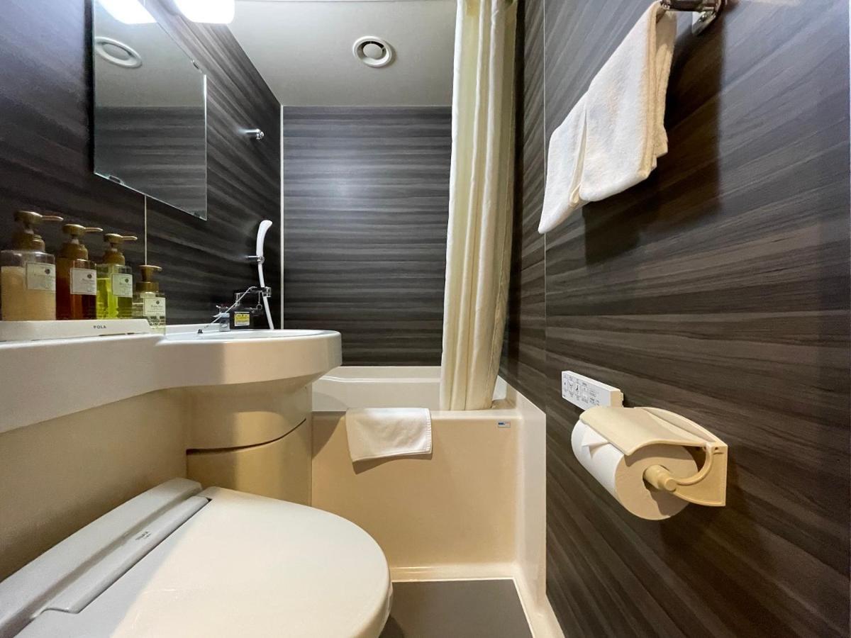 Kohoku Hotel Цутиура Экстерьер фото